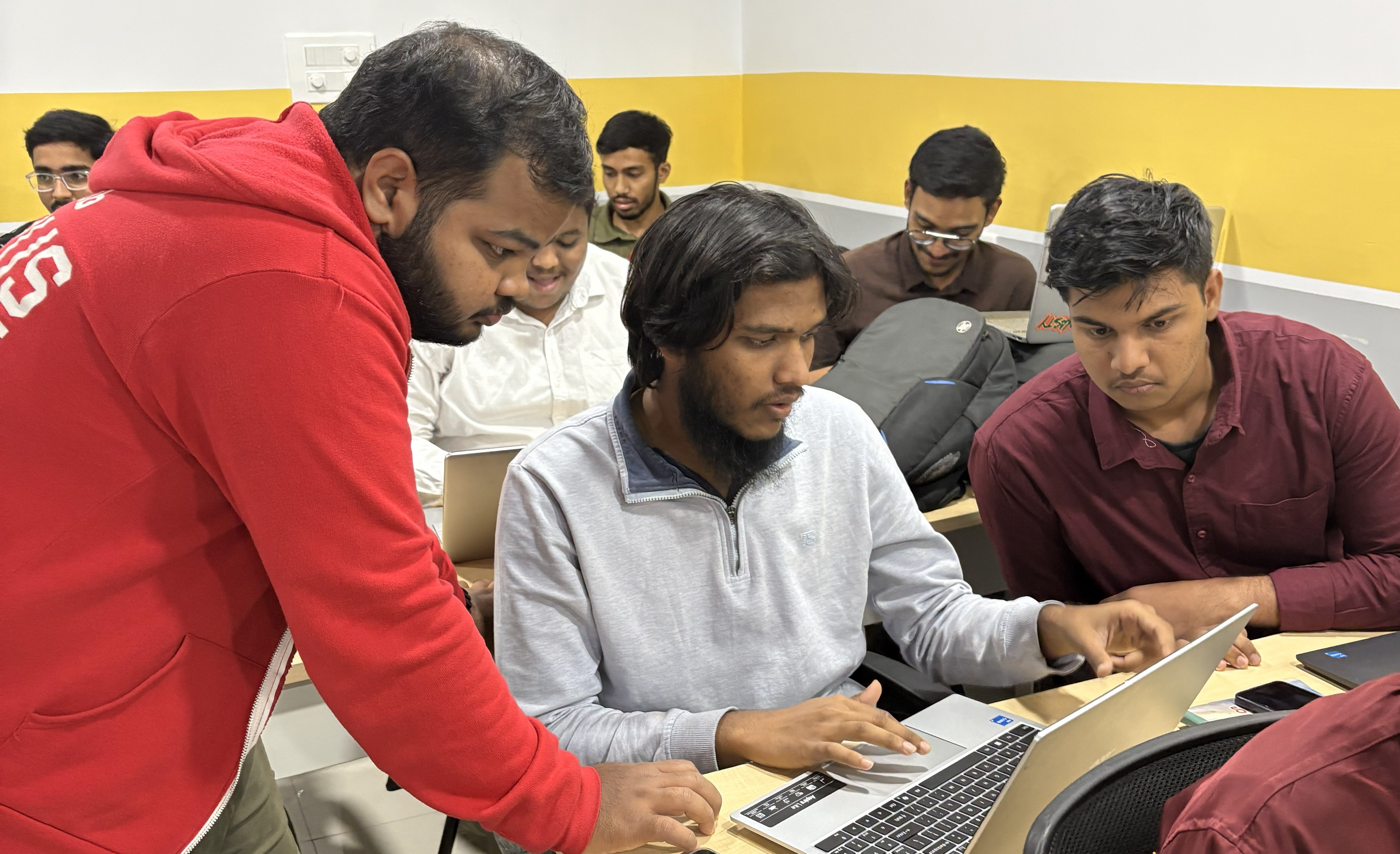 Senior cyber security mentor teaching threat analysis and SOC workflows